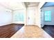 Bright and airy entryway with tile and wood-look floors at 10091 Austrina Oak Loop, Winter Garden, FL 34787