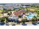 Community amenity center, pool, and surrounding neighborhood at 10091 Austrina Oak Loop, Winter Garden, FL 34787