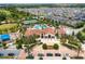 Community pool, tennis courts, and residential neighborhood at 10091 Austrina Oak Loop, Winter Garden, FL 34787
