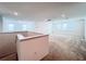 Spacious loft area with multiple windows and carpet at 10091 Austrina Oak Loop, Winter Garden, FL 34787