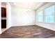 Spacious dining room with wood-look floors and chandelier at 10091 Austrina Oak Loop, Winter Garden, FL 34787