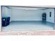 Spacious garage with epoxy floor and room for storage at 10091 Austrina Oak Loop, Winter Garden, FL 34787
