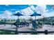 playground with two shade structures at 10091 Austrina Oak Loop, Winter Garden, FL 34787