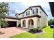 Beautiful two story home with arched entryway at 10091 Austrina Oak Loop, Winter Garden, FL 34787