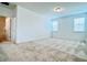 Spacious bedroom with carpeted floors and en-suite bathroom at 10091 Austrina Oak Loop, Winter Garden, FL 34787