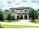 Two story home with a three car garage at 10091 Austrina Oak Loop, Winter Garden, FL 34787