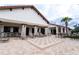 Resort-style pool area with lounge chairs and chessboard patio at 10091 Austrina Oak Loop, Winter Garden, FL 34787