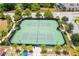 Two well-maintained tennis courts at 10091 Austrina Oak Loop, Winter Garden, FL 34787