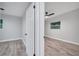 Cozy bedroom with wood-look floors and a ceiling fan at 1318 Terre Cia Ave, Orlando, FL 32807