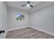 Spacious bedroom featuring wood-look floors and a ceiling fan at 1318 Terre Cia Ave, Orlando, FL 32807