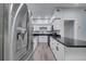 Modern kitchen with stainless steel appliances and granite countertops at 1318 Terre Cia Ave, Orlando, FL 32807