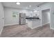 Modern kitchen with stainless steel appliances and granite countertops at 1318 Terre Cia Ave, Orlando, FL 32807