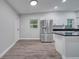 Modern kitchen with stainless steel appliances and granite countertops at 1318 Terre Cia Ave, Orlando, FL 32807