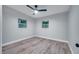 Spacious bedroom with two windows and a ceiling fan at 1318 Terre Cia Ave, Orlando, FL 32807