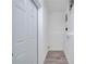 Laundry area with white walls and wood-look floors at 1318 Terre Cia Ave, Orlando, FL 32807