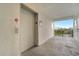 Building hallway with elevator access and balcony views at 4721 Clock Tower Dr # 302, Kissimmee, FL 34746