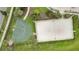 Outdoor recreation area with basketball and sand volleyball courts at 4721 Clock Tower Dr # 302, Kissimmee, FL 34746