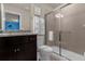 Bathroom with granite countertop and shower at 3209 Lilac Way, Davenport, FL 33897
