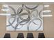 Modern dining area with abstract art and contemporary lighting at 3209 Lilac Way, Davenport, FL 33897