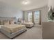 Two twin beds, dresser, and large window with blinds at 3209 Lilac Way, Davenport, FL 33897