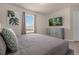 King-size bed, dresser, and wall-mounted TV at 3209 Lilac Way, Davenport, FL 33897