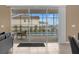 Stunning view of the pool and surrounding neighborhood from inside the home at 3209 Lilac Way, Davenport, FL 33897