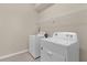 Clean laundry room featuring a Whirlpool washer and dryer at 3209 Lilac Way, Davenport, FL 33897