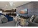 Spacious living room with comfortable seating and large TV at 3209 Lilac Way, Davenport, FL 33897