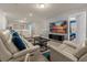 Spacious game room with comfortable seating and large TV at 3209 Lilac Way, Davenport, FL 33897