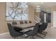 Modern dining room with a large table and statement lighting at 3209 Lilac Way, Davenport, FL 33897