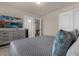 Bedroom with ensuite bathroom and game room access at 3209 Lilac Way, Davenport, FL 33897