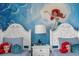 Twin beds in a Little Mermaid themed bedroom at 3209 Lilac Way, Davenport, FL 33897