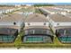Aerial view of houses with private pools at 3209 Lilac Way, Davenport, FL 33897