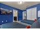 Two twin beds, a TV, and en-suite bathroom with a single vanity at 3209 Lilac Way, Davenport, FL 33897