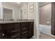 Bathroom with double vanity and bathtub at 3209 Lilac Way, Davenport, FL 33897