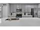 Kitchen with stainless steel appliances and island at 4716 Terra Esmeralda Dr, Kissimmee, FL 34746