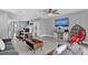 Living room with comfy seating and sliding doors at 4716 Terra Esmeralda Dr, Kissimmee, FL 34746