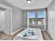 Comfortable bedroom with two windows and a queen-size bed at 4716 Terra Esmeralda Dr, Kissimmee, FL 34746
