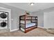 Cozy bedroom with a bunk bed, perfect for children at 4716 Terra Esmeralda Dr, Kissimmee, FL 34746
