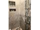 Modern shower with stone and tile details at 3100 Parkway Blvd # 611, Kissimmee, FL 34747