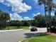 Parking lot with surrounding trees and landscape at 3100 Parkway Blvd # 611, Kissimmee, FL 34747