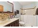Bathroom with walk-in shower and a vanity with modern finishes at 50 2Nd St, Saint Cloud, FL 34769