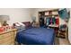 Cozy bedroom with a double bed and a spacious closet at 50 2Nd St, Saint Cloud, FL 34769