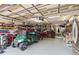 Spacious garage with ample storage and a golf cart at 50 2Nd St, Saint Cloud, FL 34769