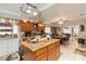 Spacious kitchen with island, stainless steel appliances, and ample cabinetry at 50 2Nd St, Saint Cloud, FL 34769