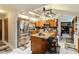 Modern kitchen with stainless steel appliances and an island for extra prep space at 50 2Nd St, Saint Cloud, FL 34769