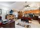 Home office with wood desk and built-in shelving at 50 2Nd St, Saint Cloud, FL 34769