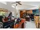 Bright home office featuring a large desk and ample space for work at 50 2Nd St, Saint Cloud, FL 34769