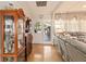Bright entryway with hardwood floors, and view to backyard at 50 2Nd St, Saint Cloud, FL 34769