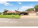 Mid-century modern home with a three-car garage at 50 2Nd St, Saint Cloud, FL 34769